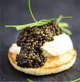Mini blinis with French crème fraiche